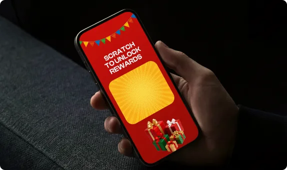 A hand holding a smartphone showcasing a digital scratch-to-unlock rewards application feature interface